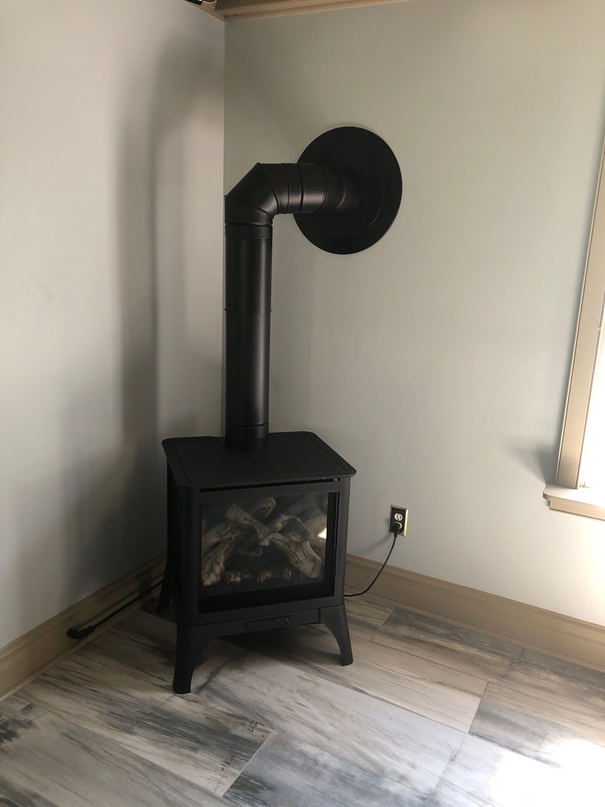 Mendota gas stove · out the side wall
